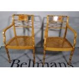 A pair of Regency style cane seated open armchairs, (2).