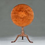 A mid-18th century mahogany tripod occasional table,
