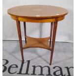 An Edwardian satinwood banded oval occasional table on square tapering supports,