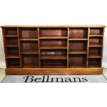 A 20th century oak open bookcase, 205cm wide x 104cm high.