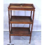 A Charles X rosewood three-tier étagère with rectangular tray top on ring-turned supports,
