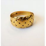 A gold keeper style ring, with pierced decoration, ring size N and a half, weight 5.