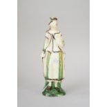 A rare creamware figure of a shepherdess, circa 1780,