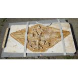 A large 20th century relief moulded plaster plaque depicting a coat of arms, 122cm wide x 61cm high.