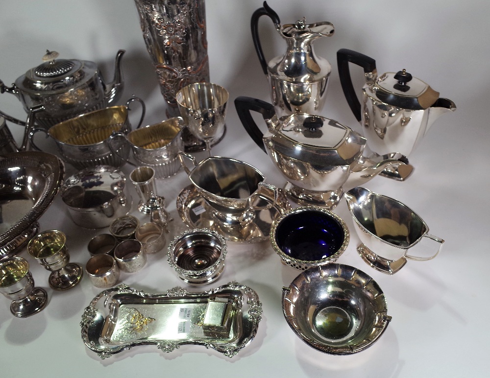 Silver plated wares, including; a vase of tapering form, tea pots, jugs, napkin rings and flatware, - Image 3 of 4