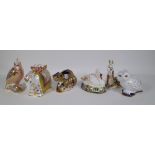 Six Royal Crown Derby Imari paperweights including a llama, swan, chameleon, parrot,