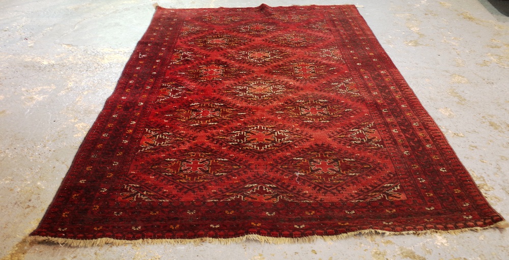 An Afghan carpet, 280cm x 210cm.