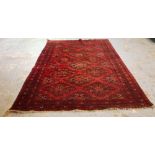 An Afghan carpet, 280cm x 210cm.