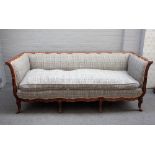 A Louis XV style square back parcel gilt sofa, with foliate moulded frame, on scroll supports,