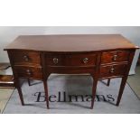 A 19th century mahogany serpentine sideboard, 184cm wide.