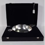 A 20th century pewter Scandinavian quaich, cased.