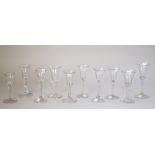 A group of ten wine glasses, various dates, each with a bell bowl and plain stem, 14cm. to 17cm.