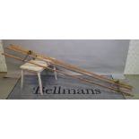 A pine and metal ceiling mounted clothes airier with a pair of wheel pulleys, 244cm wide,