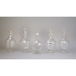 A set of four urn shaped glass decanters and stoppers, 19th century, probably German or Austrian,