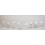 A group of eight bonnet glasses, late 18th century, with various moulded bowls on circular feet,