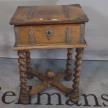 An 18th century oak bible box on later added 'X' frame stand, 52cm wide x 77cm high.