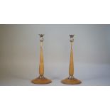A pair of David Linley style oak and silver plated candlesticks,