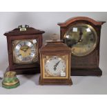 A group of four late 19th/ early 20th century mantel clocks.