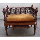 A late 19th century North African bench with extensive bobbin turned decoration,