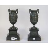 A pair of bronze urn form garnitures, late 19th century,