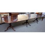 A Regency style mahogany triple pillar extending dining table,