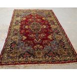 A Kerman rug, 227cm x 140cm.