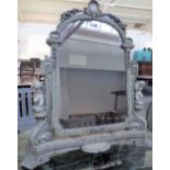 An early 20th century polychrome painted gesso swing frame toilet mirror,