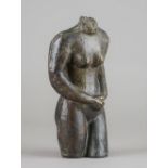 A patinated bronze torso, late 19th century, probably French incised 'Rodin' to the chest. 27.