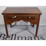 An 18th century oak writing table.