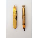 A 9ct gold slide action pencil holder by S Mordan & Co,