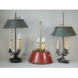 A 20th century French gilt brass Bouillotte lamp with red tole shade,