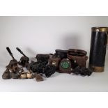 Colletables, inlcuding; a quantity of early 20th century binoculars, two stamp presses,