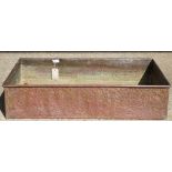 A large rectangular copper planter with beaten finish, 110cm x 72cm x 24cm.