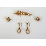 A pair of gold, diamond and half pearl set brooches,