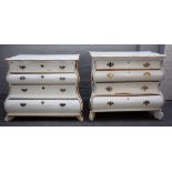 A near pair of early 19th century and later Dutch parcel gilt and white painted bombe four drawer