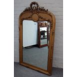 A 19th century gilt framed arch top over mantel mirror,