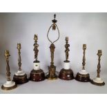 A quantity of 20th century gilt metal table lamp bases and a group of turned wooden wall light