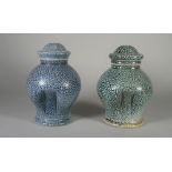 Two studio pottery salt glaze stoneware vases and covers by Steve Harrison, dated 2000,