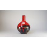 A Royal Doulton veined flambé bottle vase, shape 1618, black printed and impressed marks, 25cm.