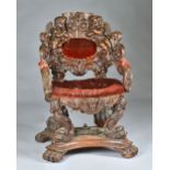 A Victorian oak throne chair,