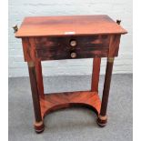 An Empire Revival gilt metal mounted mahogany work table with fitted interior over single drawer on