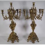 A pair of 20th century gilt brass five branch table candelabra.