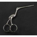 A pair of silver ribbon scissors, in the form of a stork, 10cm high, 1oz.