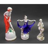 A German porcelain figure, circa 1920's, modelled as a young lady snake charmer,