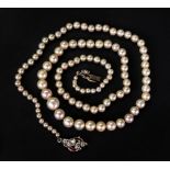 A single-row natural pearl necklace, designed as a graduated row of 105 pearls from 2.64 - 7.