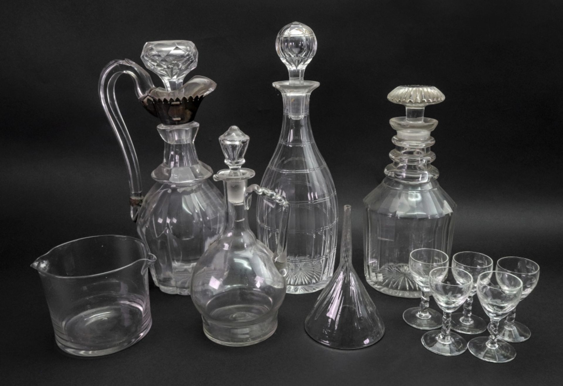 A George III style facet cut glass decanter, 19th century,