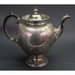 A Victorian silver baluster shape teapot, Martin Hall & Co, London 1871, retailed by W.