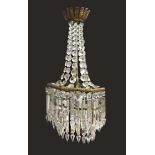 A Regency style gilt metal mounted glass chandelier,