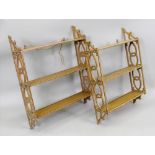 A set of Regency style grained faux pine three tier wall hanging shelves,