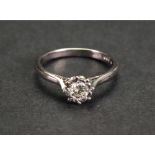 An 18ct white gold and diamond-set single-stone ring,